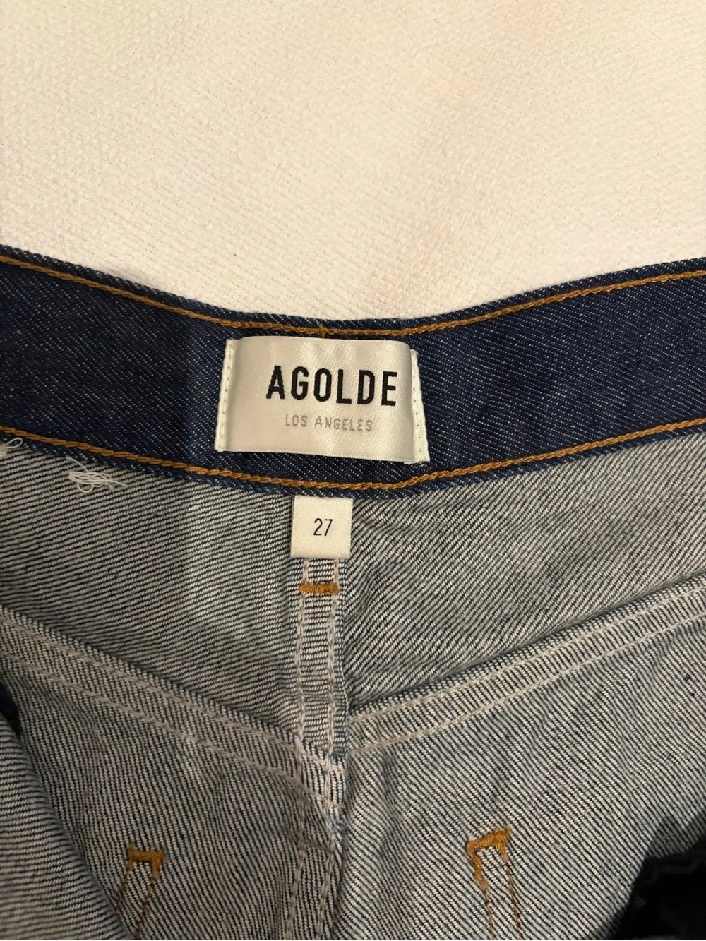 Agolde light and dark blue denim shorts